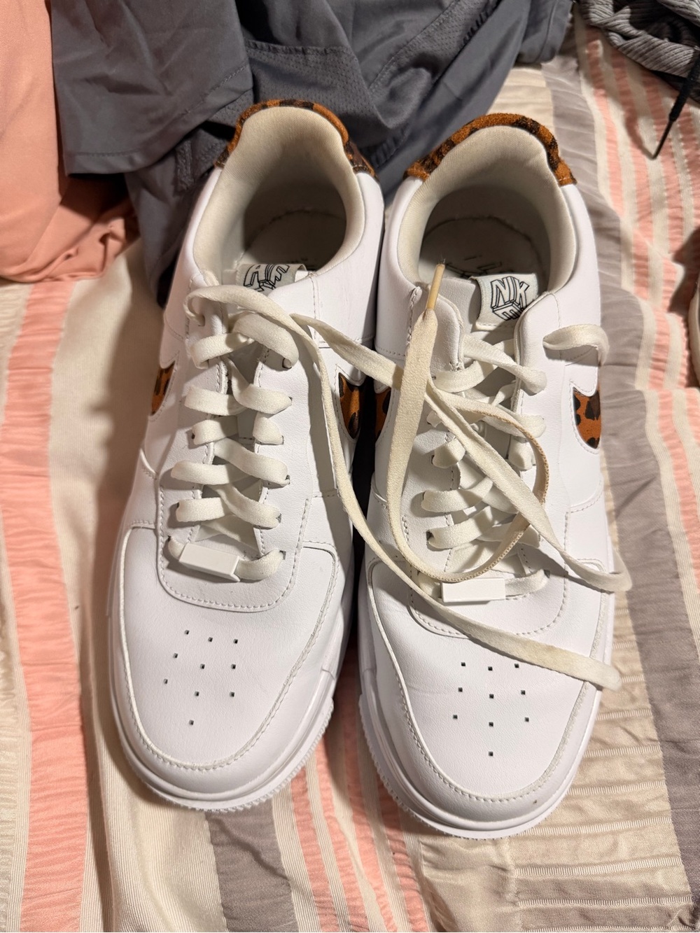 Nike White Low-Top Sneakers with Leopard Swoosh
